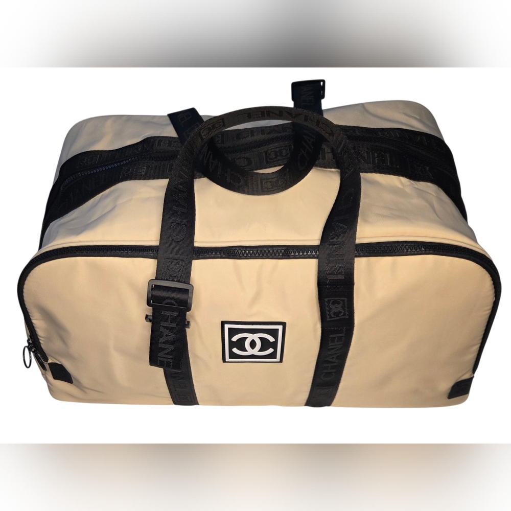 CHANEL Cream And Black Logo Duffle Bag